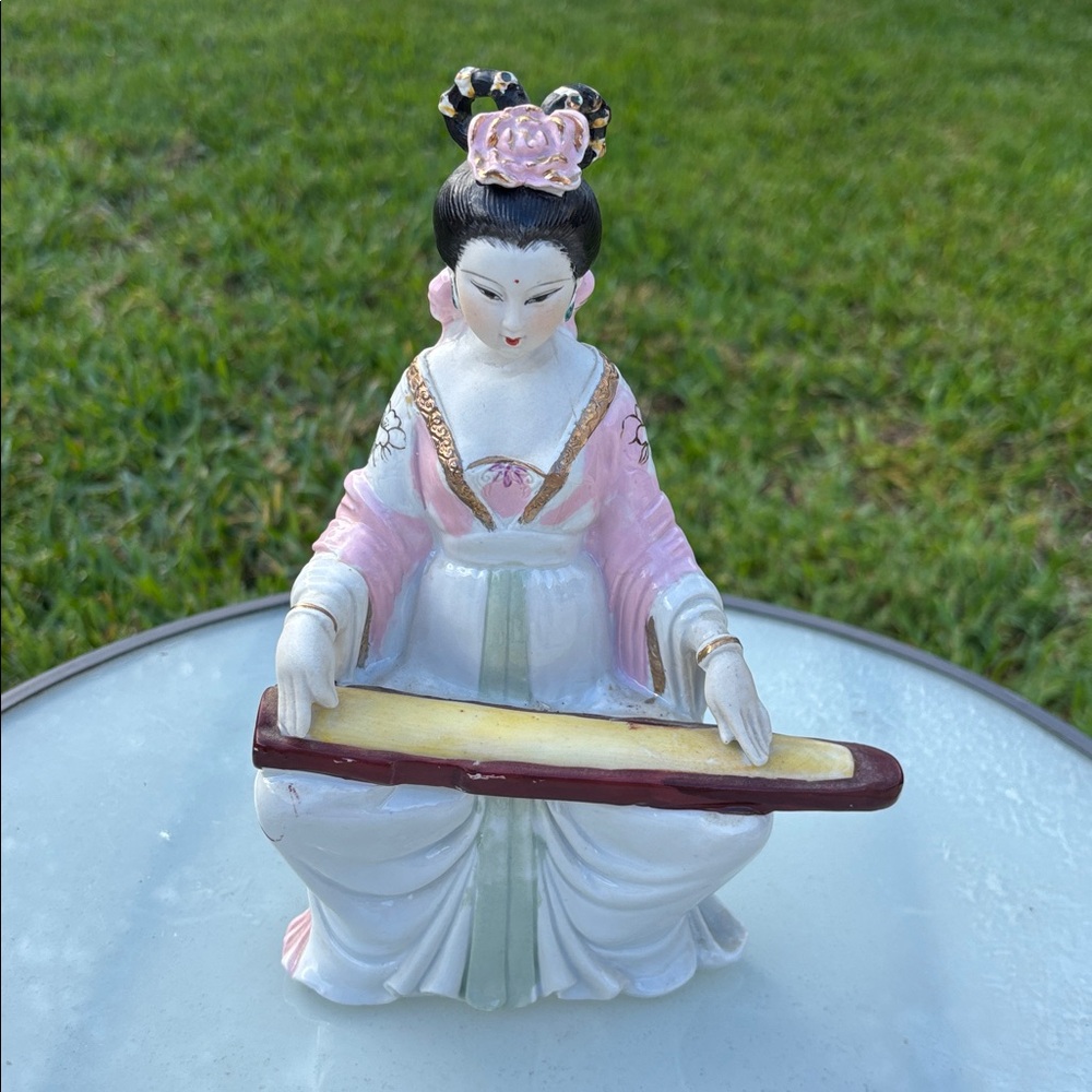Elegant Pink and White Figurine